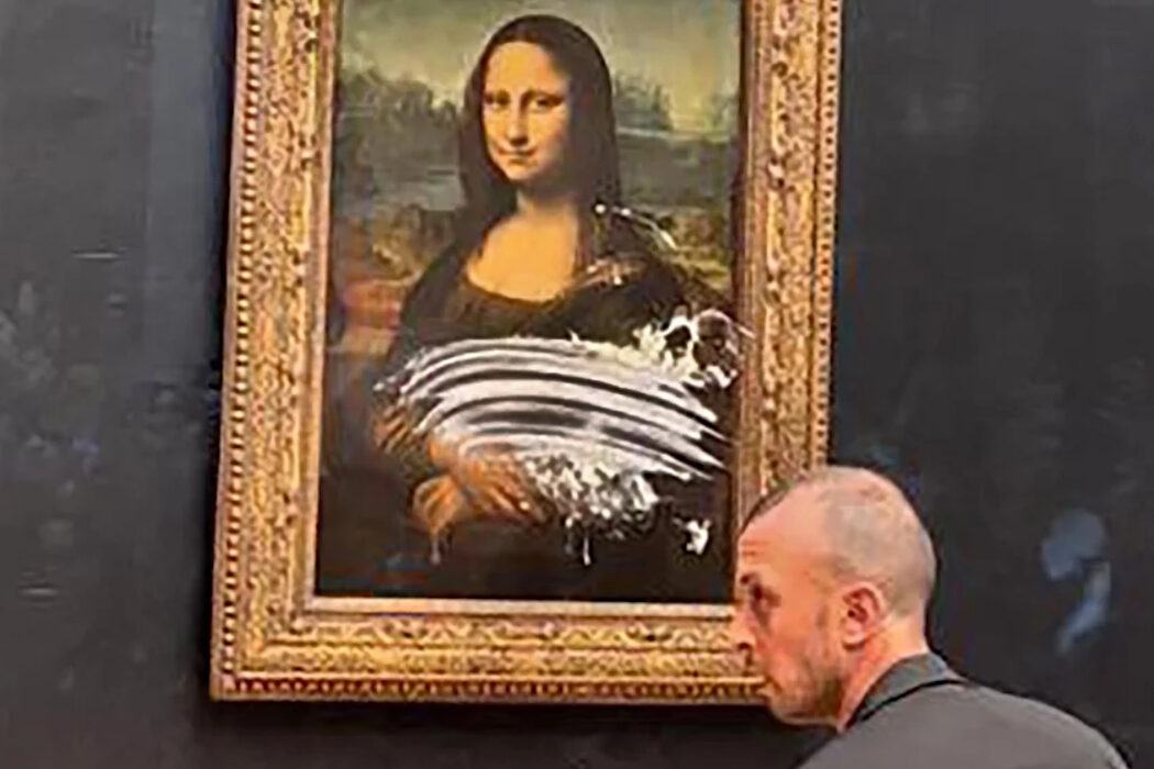 Mona Lisa Vandalised with Cake by a Man Disguised as an Old Woman